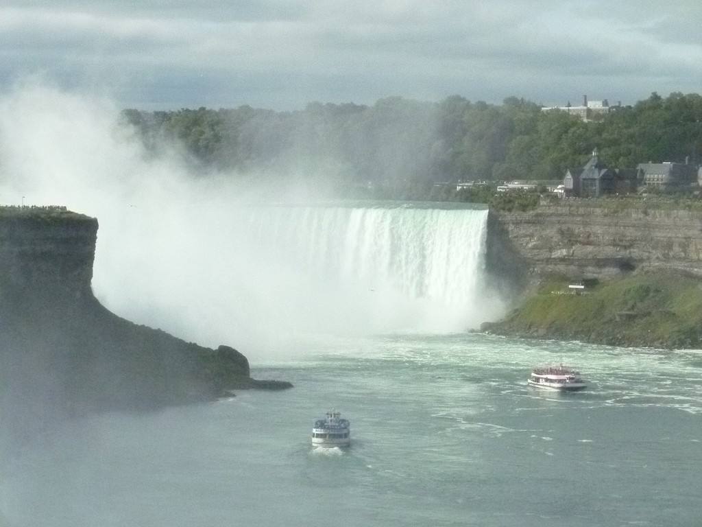 Two boats approach the base of Horseshoe Falls at Niagara Falls