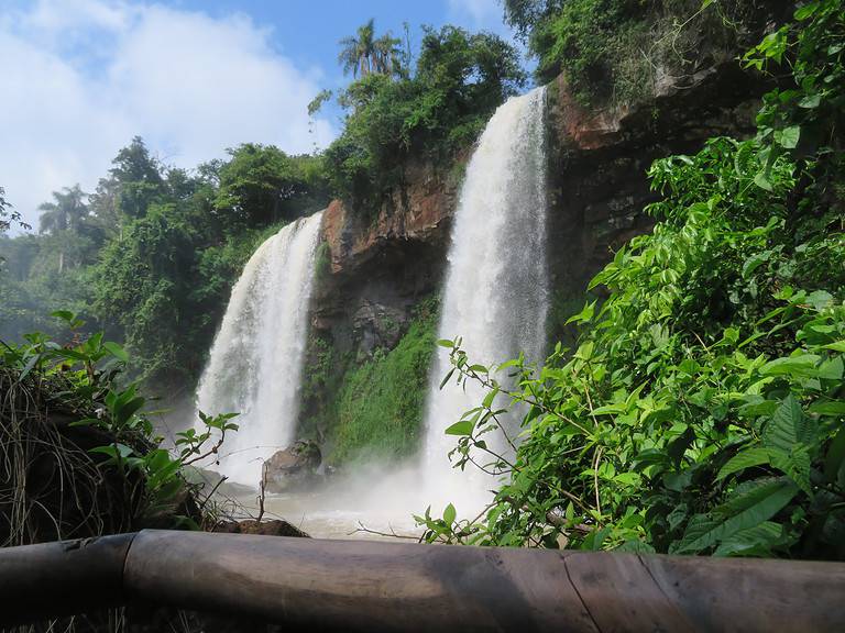 Two sisters waterfalls are two waterfalls falling over a rocky edge along the lower trail at Iguazu Falls in Argentina