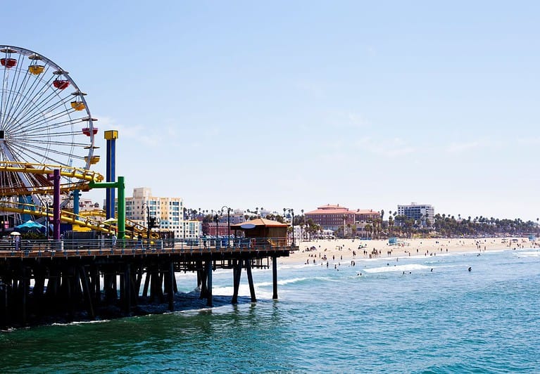 Santa Monica beach with the pier to the left of it.